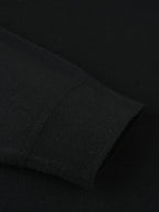Maxwell højhalset sweater, nærbillede af ribkant ved ærmemanchet i sort