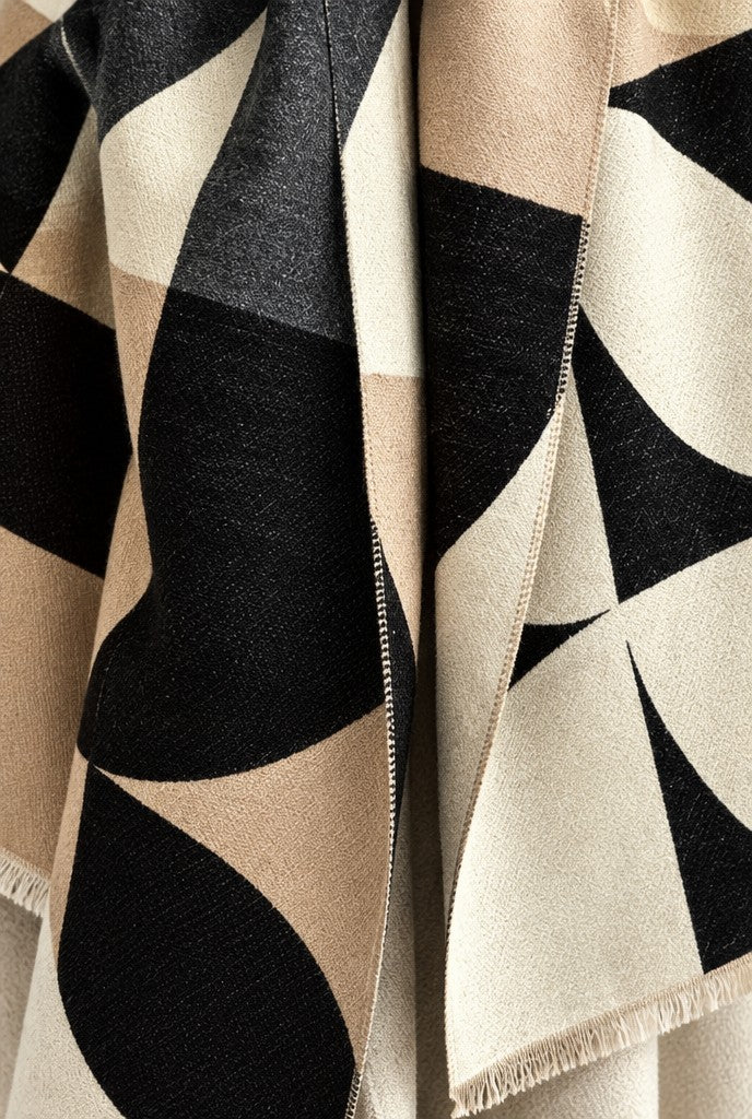 Tyra | Reversible Geometric Fringe Poncho, close-up 1