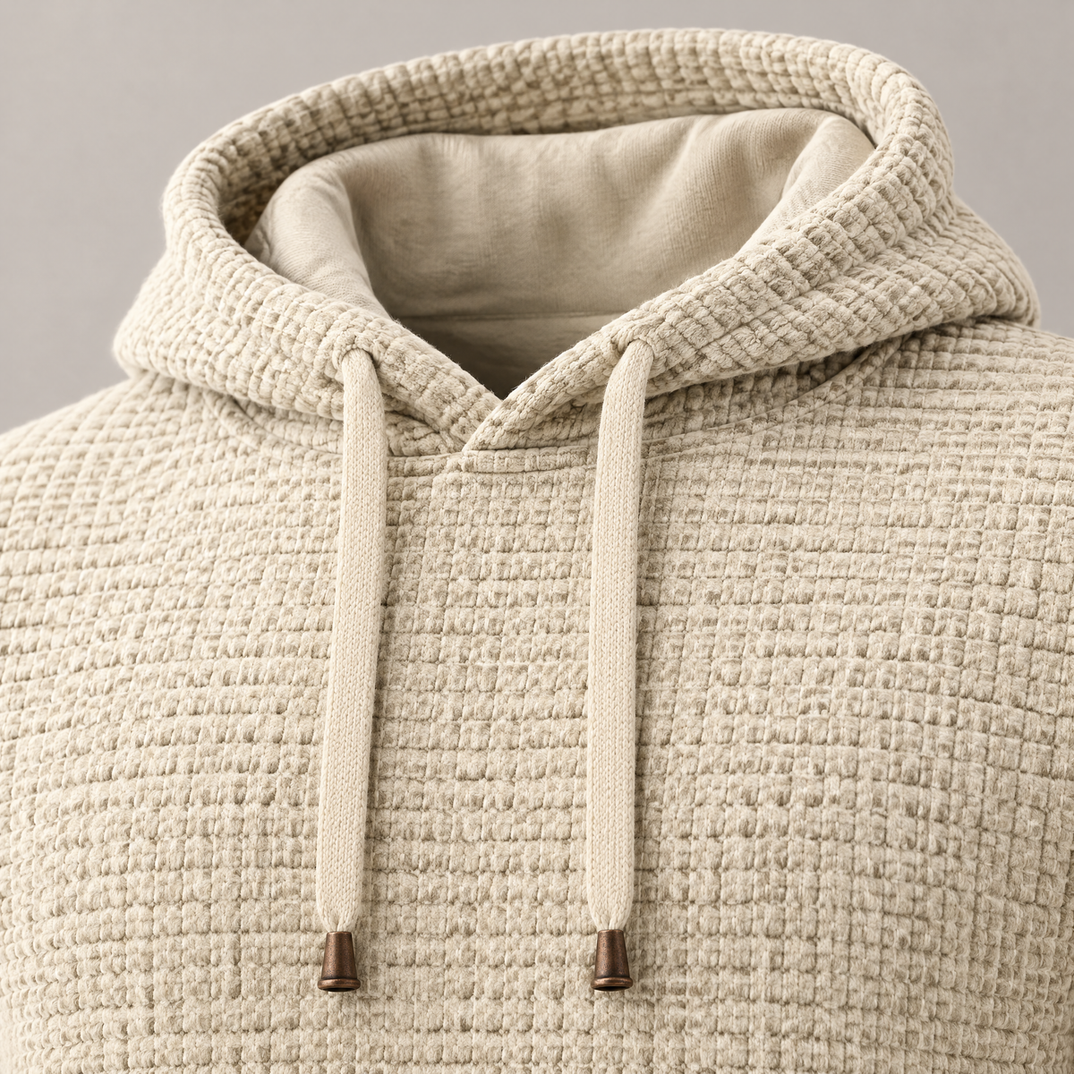 David waffle-textured drawstring hoodie – close-up of the drawstrings with bronze-tone tips (Beige)