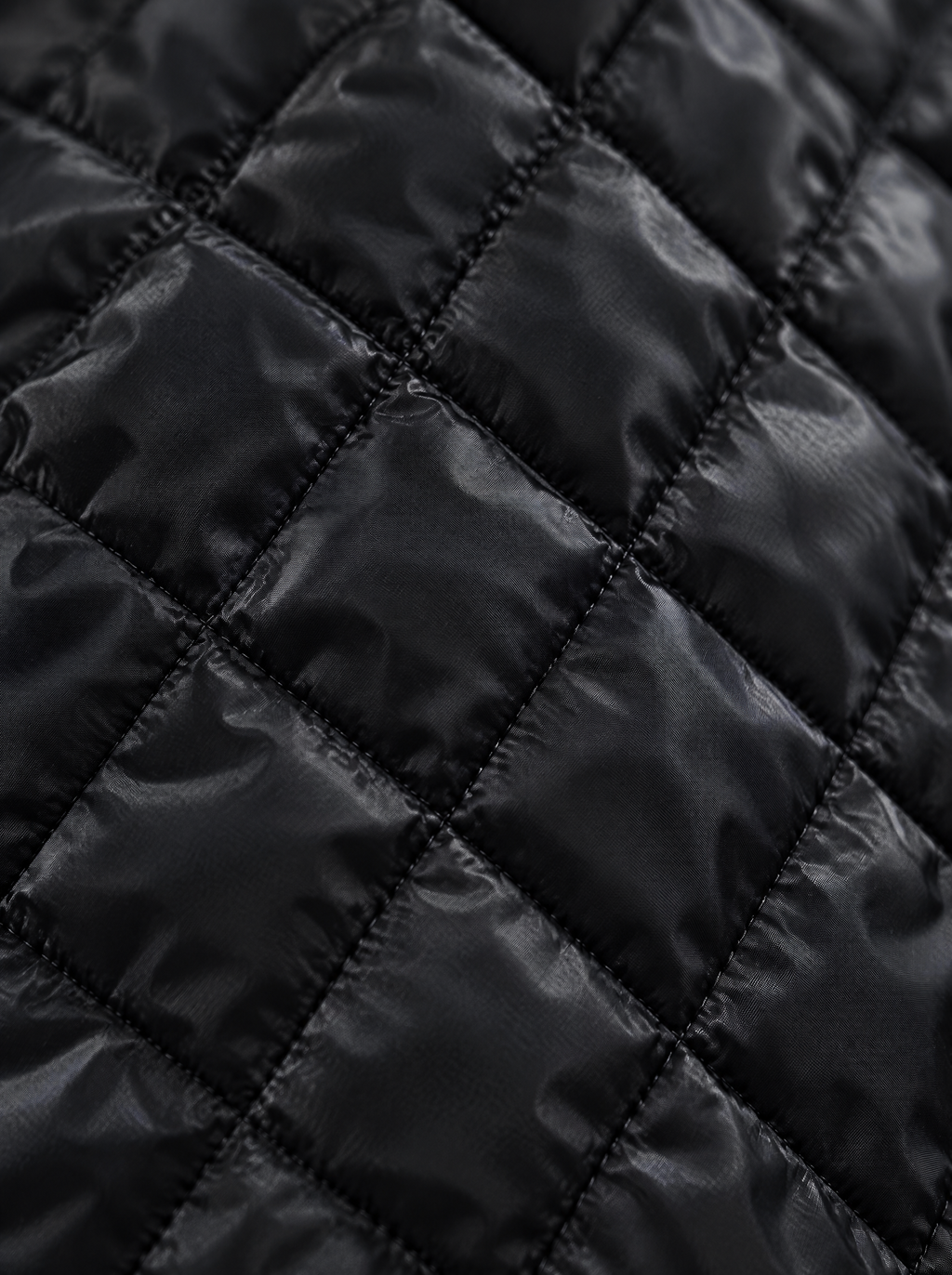 Kendra quilted bomber jacket – close-up of the diamond quilting (Black)