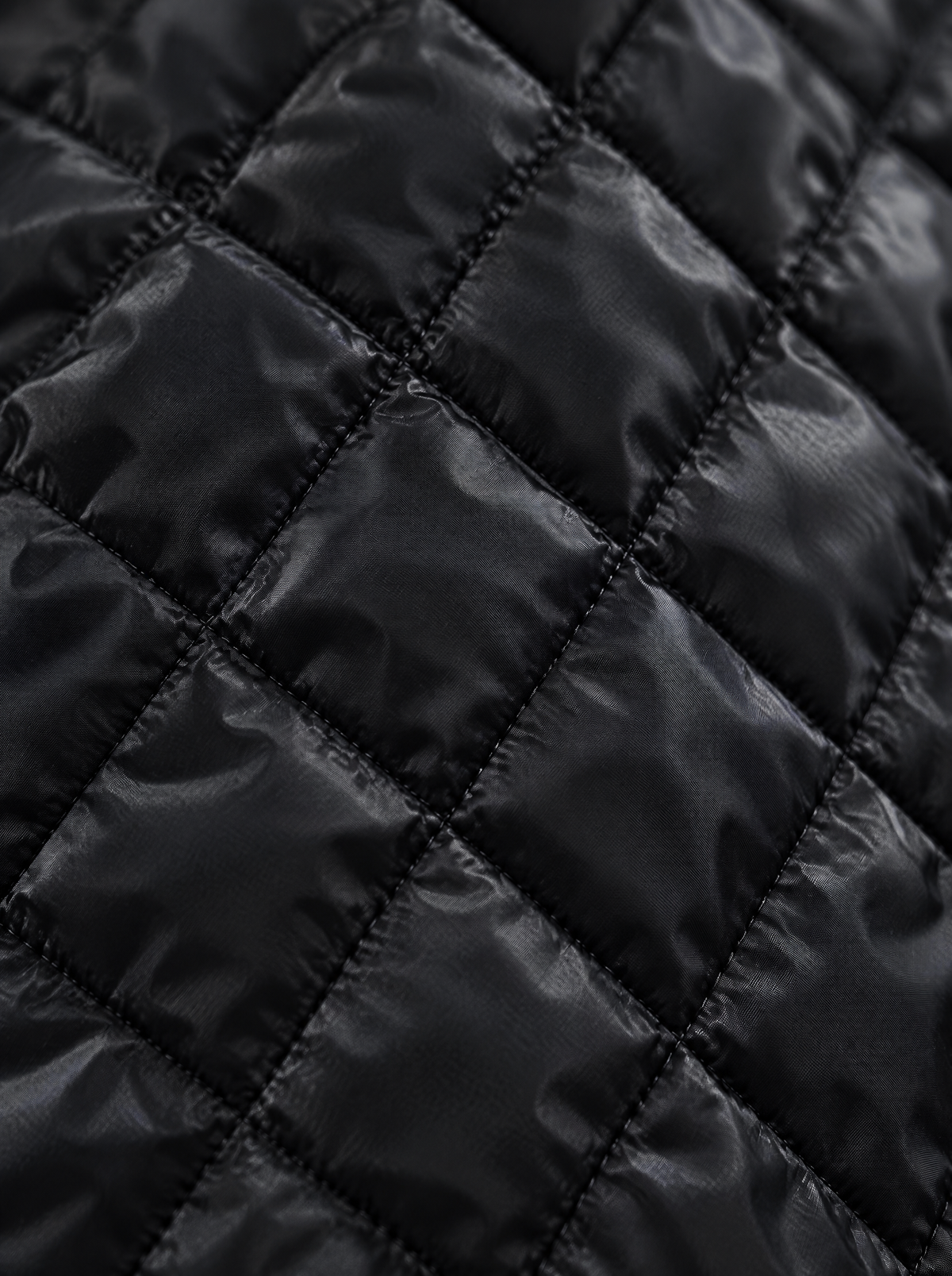 Kendra quilted bomber jacket – close-up of the diamond quilting (Black)